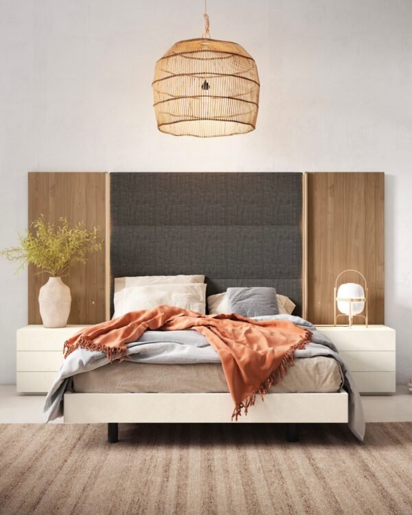 Moderno dormitorio con cabecero tapizado.